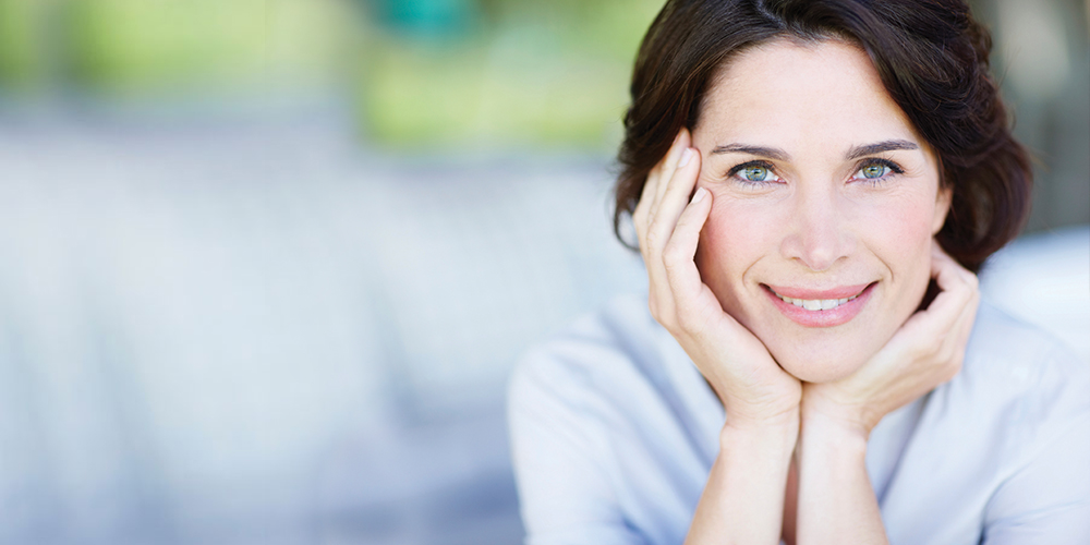 Smiling woman with dental fillings